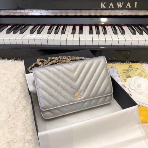 Torebka Chanel WOC Original Caviar Leather Flap na ramię V33814, łańcuszek w kolorze srebrno-szarym ze złota