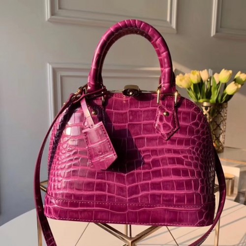 Torebka Louis Vuitton ze skóry krokodyla ALMA BB N90897 Purple