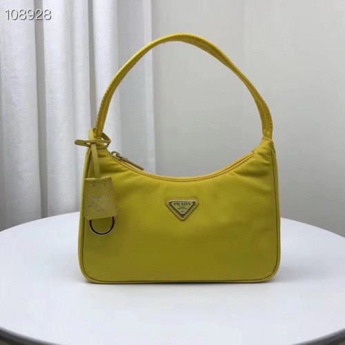 Prada Re-Edition 2000 nylonowa mini torebka 1NE515 żółta