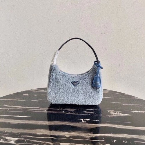 Torebka Prada Shearling mini 1NE515 jasnoniebieska
